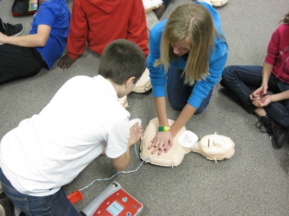 Teaching handsonly CPR at CPMS Hill Country News