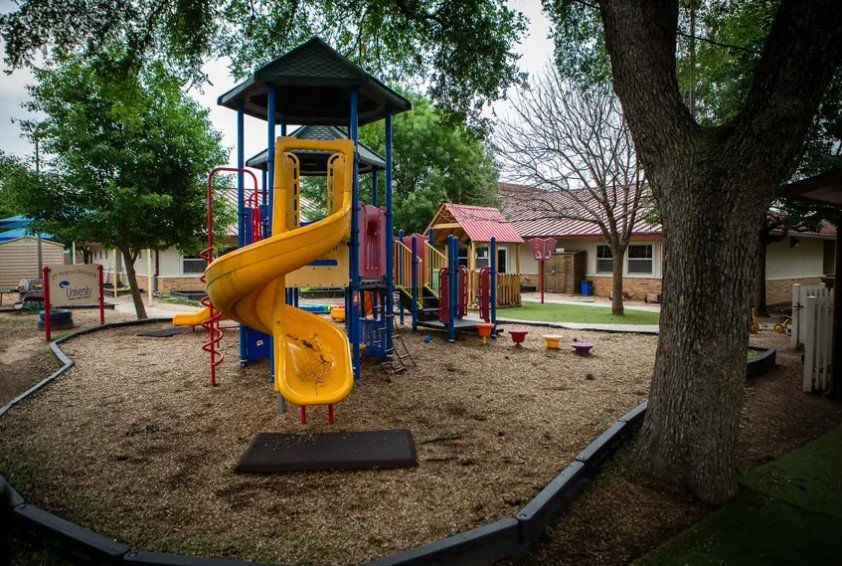 The University of Texas Child Development day care center in Austin on April 6, 2020. Restaurant, retail and movie theater workers may be called back to work as soon as Friday. But licensed child care remains open only for children of &quot;essential&quot; workers.