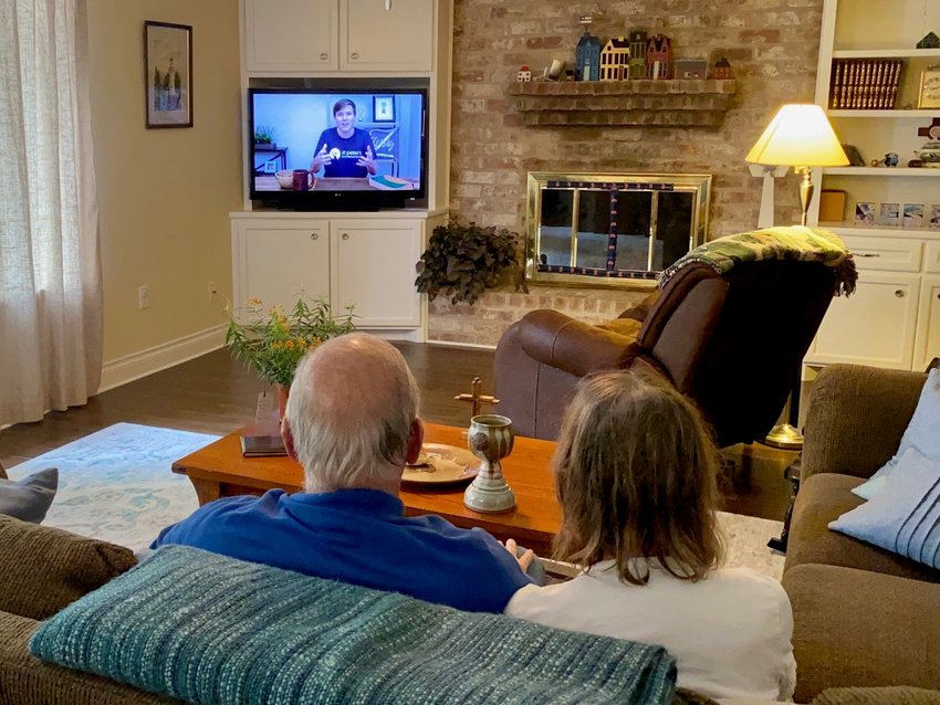Rev .Bob Johnson and his wife, Susan Johnson watching the St. Peter&rsquo;s United Methodist Church&rsquo;s West Campus live-stream services.