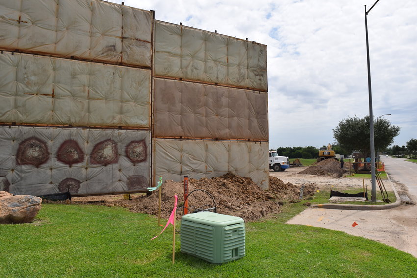 Drilling of a new well for the city of Katy&rsquo;s Water Plant No. 7 is causing noise disruptions for nearby residents despite the noise-buffering wall shown here being erected between the site and the nearby homes. This has caused problems for nearby homeowners working from home during the pandemic over the last year.