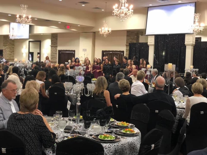 Attendees enjoy live entertainment at the 2019 Katy Christian Ministries gala. The event was the most recent in-person event because the gala was forced to go virtual in 2020. This year&rsquo;s event will be held Sept. 9 at 6 p.m. at Palacio Maria in Katy.