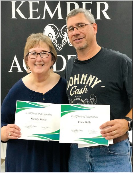 Kindergarten teacher Wendy Wade and junior high instructor Chris Gully received Kemper Academy&rsquo;s &ldquo;Making A Difference&rdquo; Award for teachers for the first term of the school year.