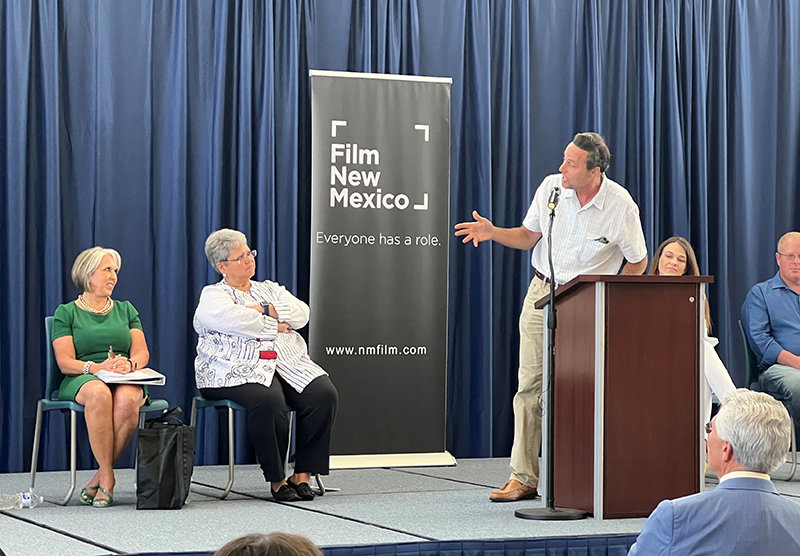 Gov. Michelle Lujan Grisham, left, with Doña Ana Community College President Monica Torres and, at podium, Las Cruces International Film Festival director Ross Marks at a presentation on the film industry in New Mexico in Las Cruces in 2022.