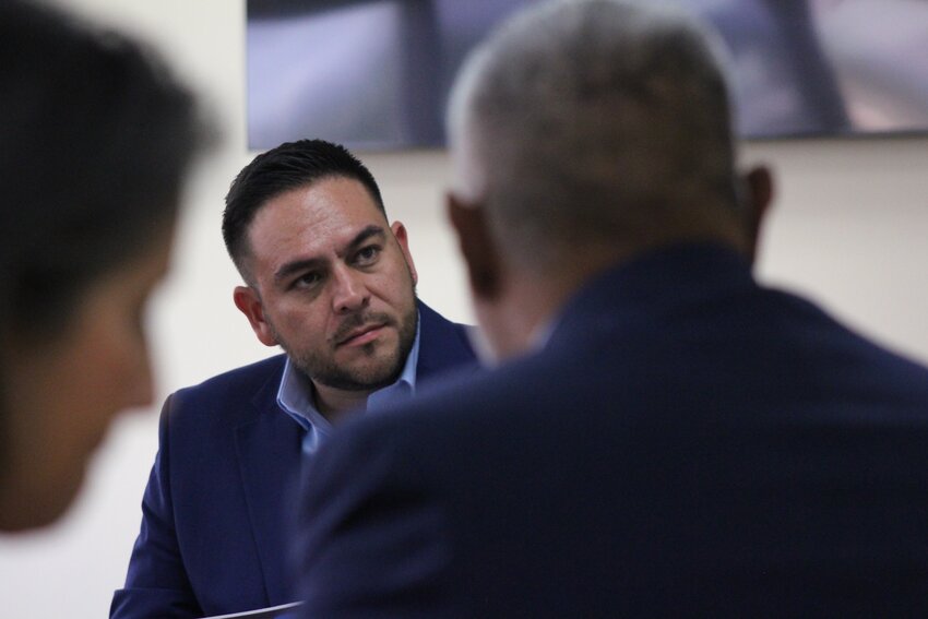 U.S. Rep. Gabe Vasquez listens to a briefing at the federal High Intensity Drug Trafficking Area office in Las Cruces on Aug. 12, 2024.