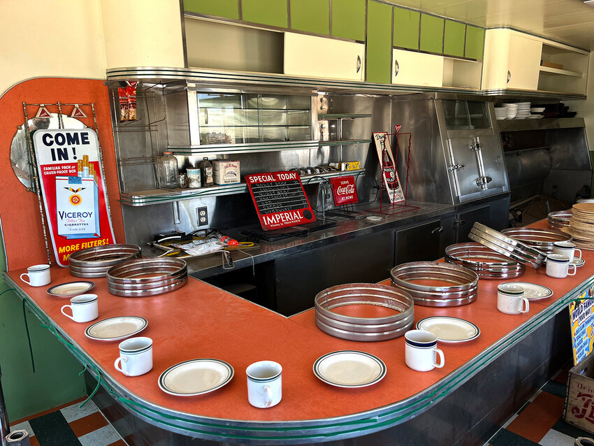 Rings for the stools under construction line the counter of the Valentine diner.