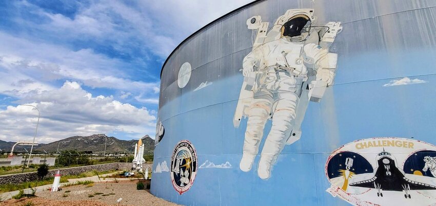 A water tank outside the Space Murals Museum in Las Cruces depicts U.S. space programs in history.