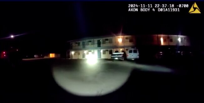 Body camera footage shows officers approaching an apartment complex on Nov. 11 before a shooting.