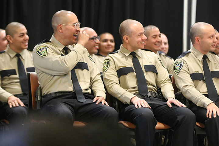 Cadets of the 29th Dona Ana County graduation class laugh at a video during their graduation ceremony on Feb. 13, 2025.