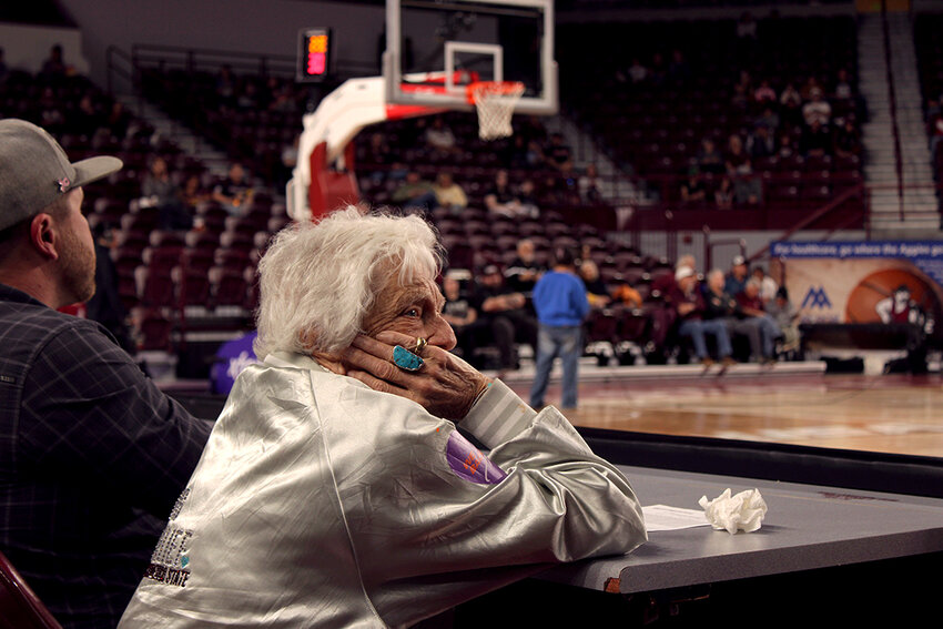 NMSU honored three women on Saturday as trailblazers and trendsetters who helped build NMSU’s women’s athletics program. One, Barbra Hubbard, is pictured here watching the New Mexico State Women’s basketball team from courtside as the game neared half-time against Sam Houston State University.