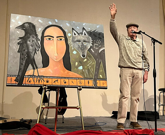 Las Cruces author and auctioneer Joe Bullock auctions off the original artwork created by artist Virginia Maria Romero for the official Las Cruces International Film Festival at the poster reveal party held Friday, March 7. The 10th annual LCIFF, runs from April 9-13. More information can be found at www.lascrucesfilmfest.com.