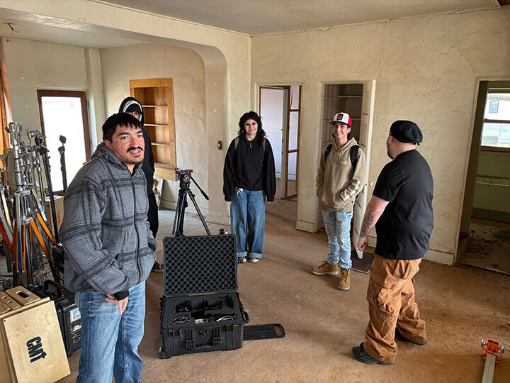 R to L: Grip/Electric Swing Diego Ramos; Director of Photography Hezakiah Oates; Sound Utility Daniela Robinson; Grip/Electric Swing James Gonzales and lead actor Austin Lucero prepare for a long day of shooting.
