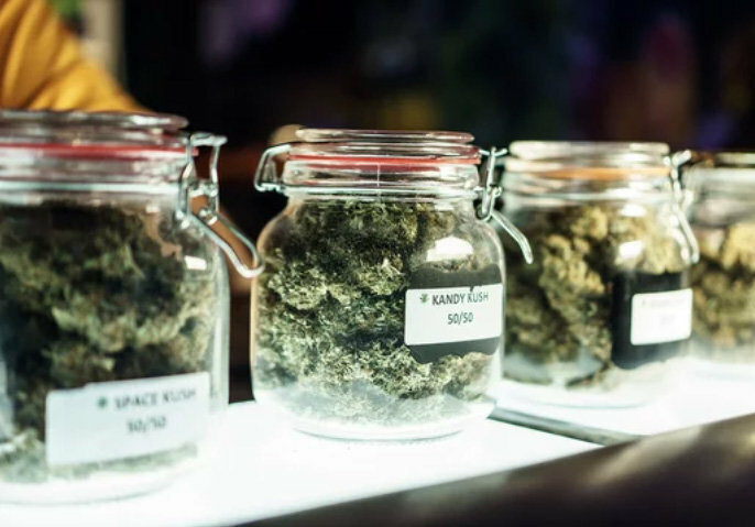 Jars of fresh cannabis are seen on display at a licensed dispensary in a 2021 file photo.