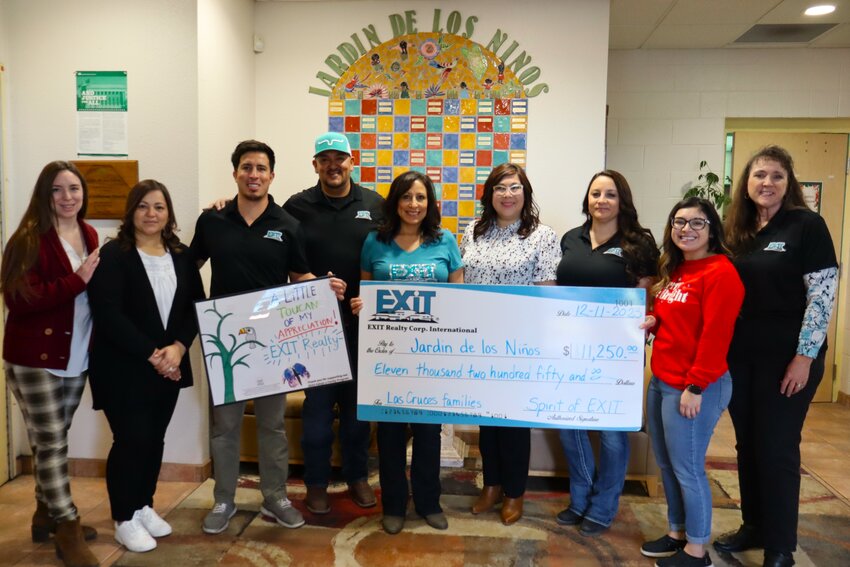 Staff from Jardin de Los Ni&ntilde;os and EXIT Reality celebrate a $11,250 fundraising campaign for the Las Cruces nonprofit.
