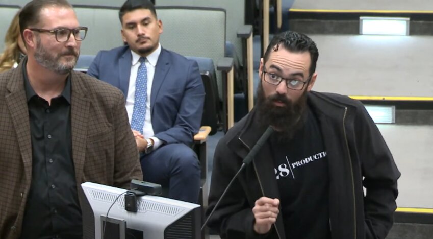 Chris Faivre, the city of Las Cruces deputy director for business development and 828 Productions&rsquo; operations and public affairs manager Jonathan Sepp appear before the Las Cruces City Council on Dec. 18, seen on the city&rsquo;s livestream.