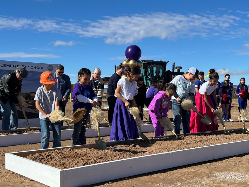 Columbia Elementary students were in front for the ceremonial groundbreaking that formally opened construction of the new Columbia Elementary School on Elks Drive in Las Cruces on Jan. 25.
