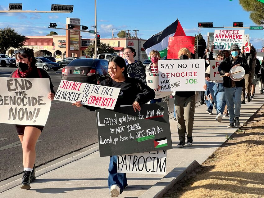 Marchers calling for a cease-fire in Gaza proceed down Main Street toward Las Cruces City Hall on Friday, Jan. 26.