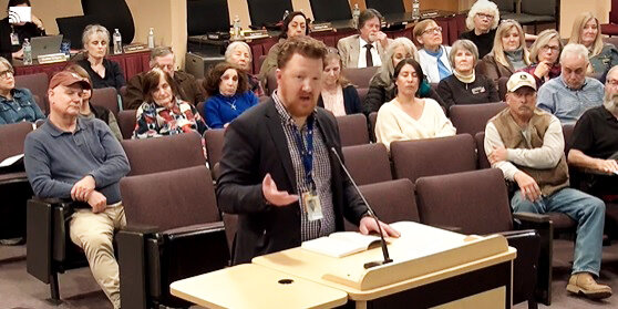 Las Cruces school board member Patrick Nolan addresses his colleagues from the floor during a Jan. 30 special meeting.