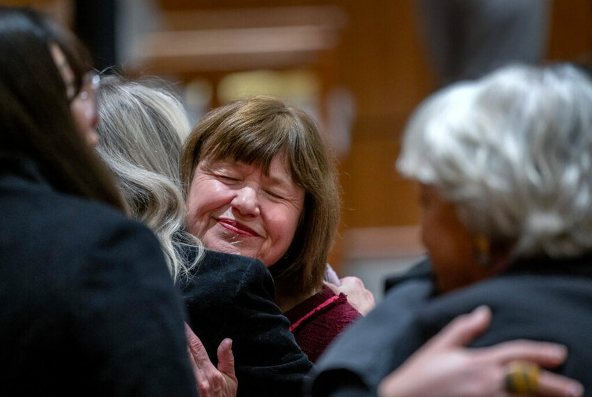 Rep. Christine Chandler, D-Los Alamos, and other representative, console each other after Senate Bill 3, the Paid Family Medical Leave Act, failed to pass during a vote on the House Floor, Wednesday, February 14, 2024.