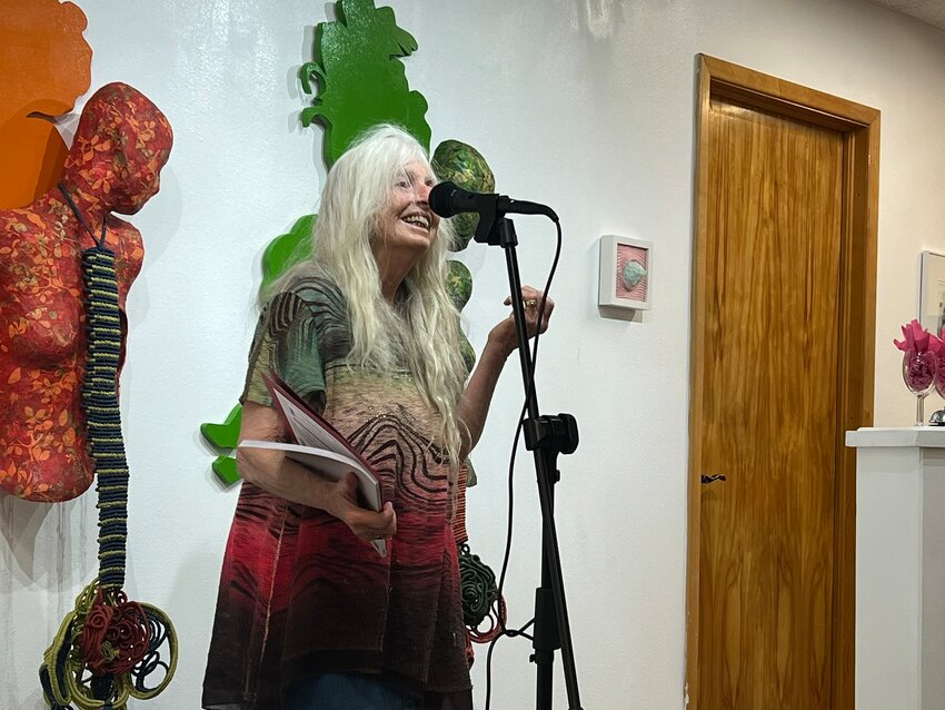 Margaret Bernstein of Las Cruces reads her haiku, “Puddle” as printed in “The New Mexico Poetry Anthology 2023” during a Saturday event at the Doña Ana Arts Council.