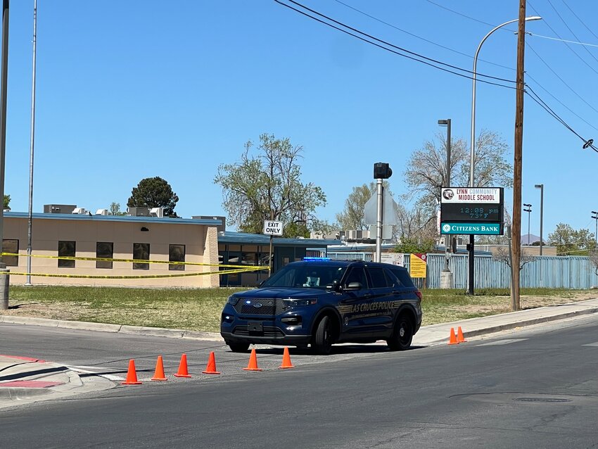 A police unit is seen near the scene of a crime investigation near Lynn Middle School on Wednesday, April 3.