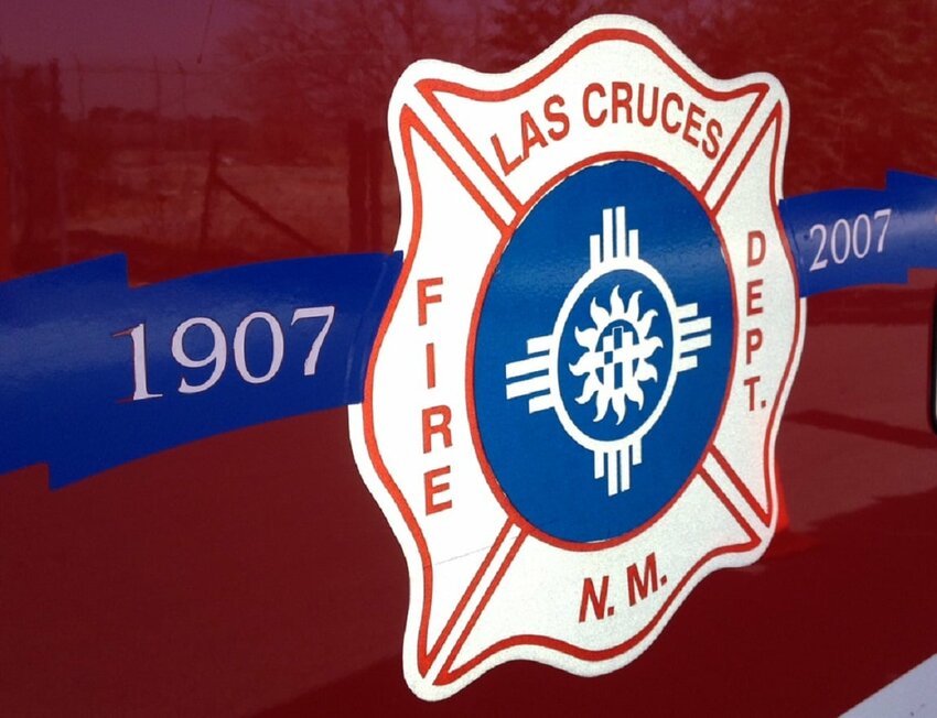 The insignia of the Las Cruces Fire Department as displayed on a fire engine.