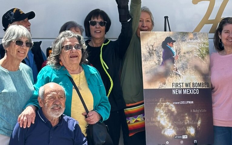 Tularosa Basin downwinders pose for photos with a movie poster for the feature 
documentary, “First We Bombed New Mexico,” during the ninth annual Las Cruces International Film Festival on Sunday, April 7, 2024.