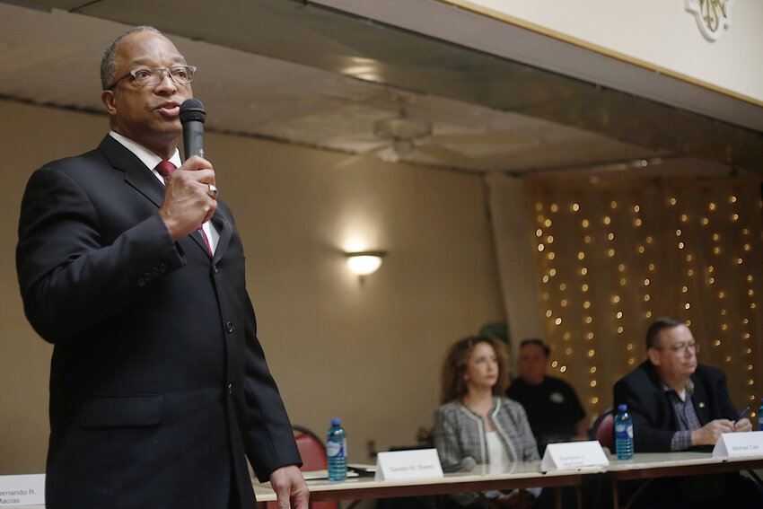 District Attorney Gerald Byers takes the mic during a two-hour debate on April 16.