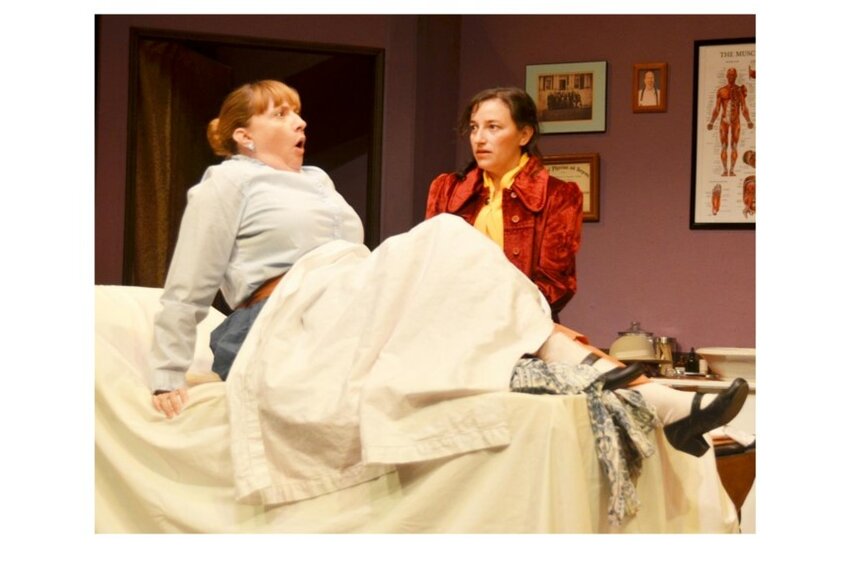 Rachel Thomas-Chappell and Cassandra Galban in a scene from No String Theatre Company’s “In the Room” at the Black Box Theatre in Las Cruces.