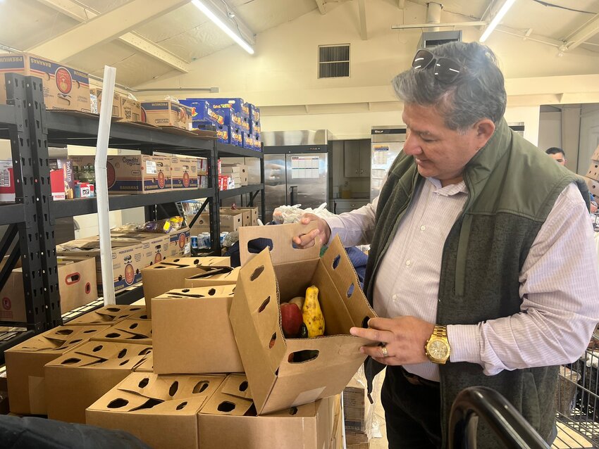 Residents receiving emergency food assistance in Hatch get a variety of produce and food items as seen in these baskets prepped for distribution on April 3.