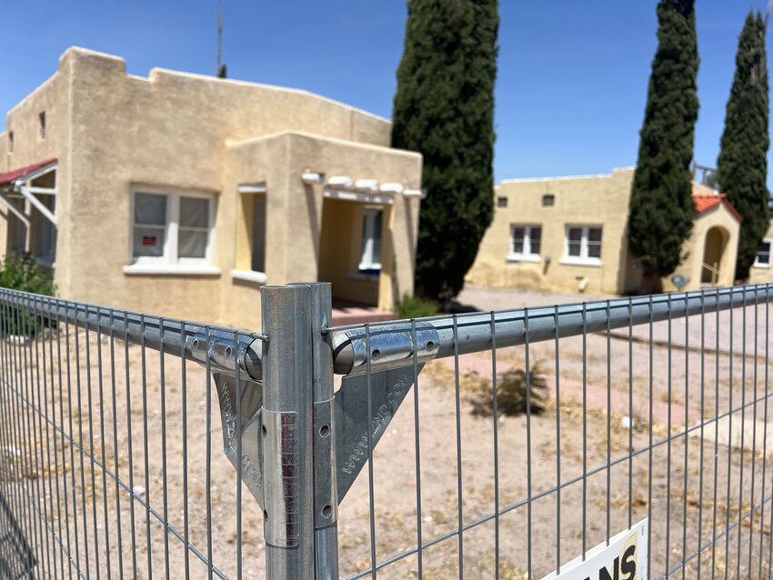 Residential buildings on University Avenue near New Mexico State University are fenced off ahead of their demolition, seen on May 6, 2024.