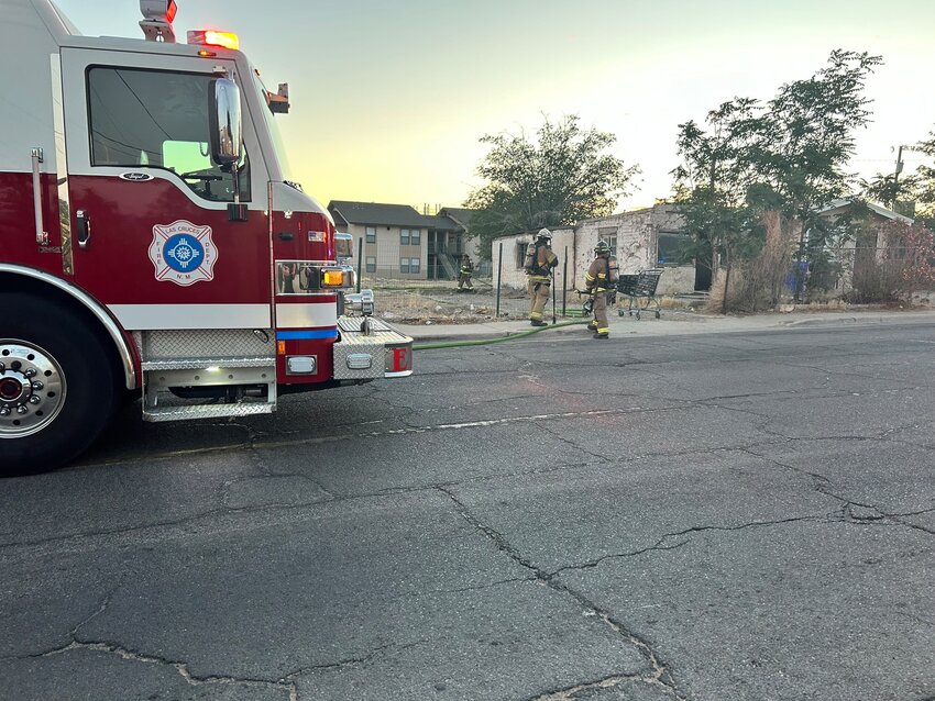 Firefighters at the scene of a fire on N. Mesquite Street in Las Cruces on May 17.