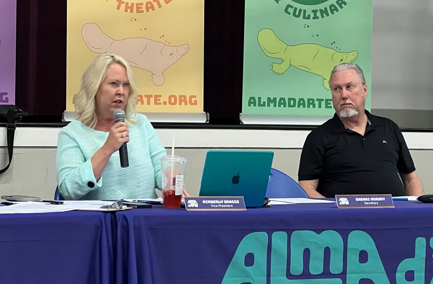 Alma d&rsquo;Arte Charter High School board members Kim Skaggs and Martin Swafford are seen during a special meeting of the school&rsquo;s governance council on June 3.