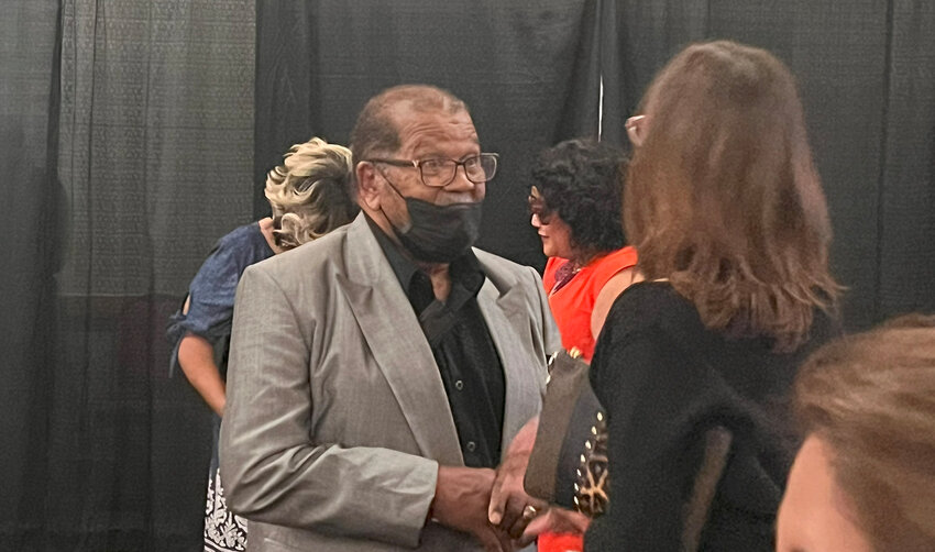 Keynote speaker Mitch Boyer of Vado speaks to an attendee at the NAACP’s Juneteenth banquet at the Las Cruces Convention Center on June 15.