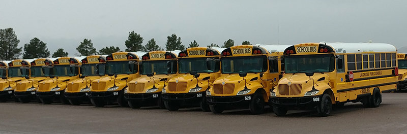 School buses are seen lined up at the STS bus lot in Las Cruces in an undated file photo.