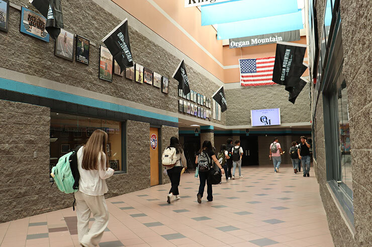 Students are seen walking through a hallway at Organ Mountain High School in a 2022 file photo.