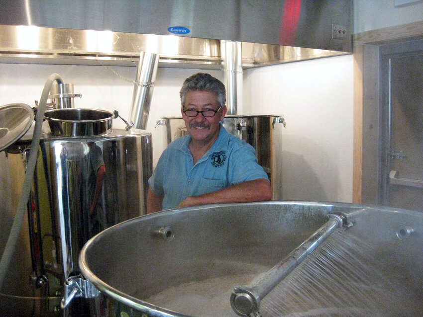 Spotted Dog brewer Jerry Grandle in his element, offering a tap list of 20 beers as the brewery marks its 10th anniversary Sept. 16 through Sept. 22.