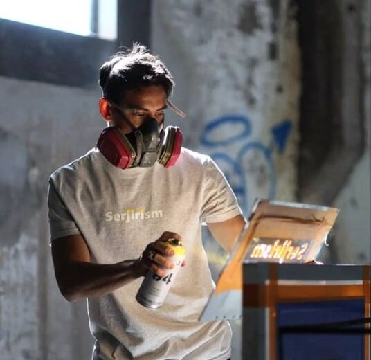Artist Serjik Leon is shown at work. &ldquo;Serjerism&rdquo; refers to his practice of fashioning art from industrial waste.