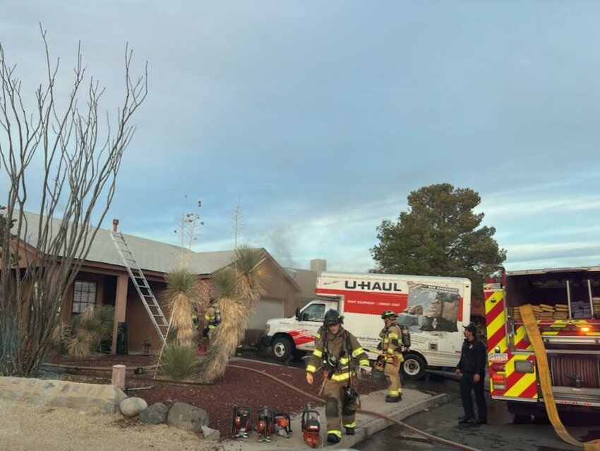 Las Cruces firefighters battle a fire at a residence on Crystal Place in Las Cruces on Nov. 26, 2024.