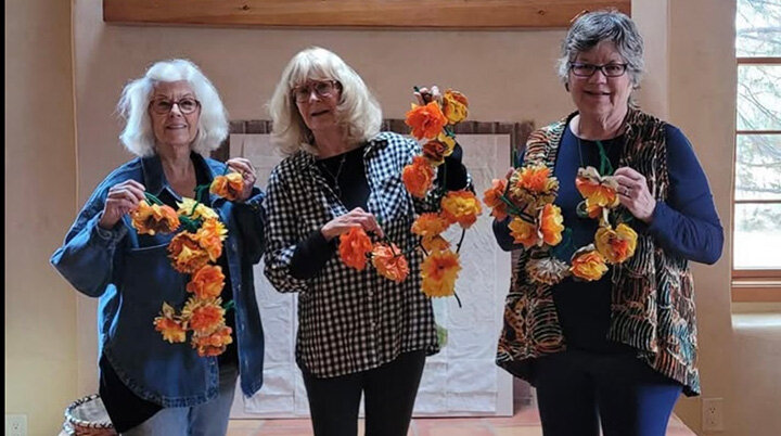 Workshoppers show off their creations in 2024.