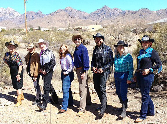 Left to right are ASTC board members Carolyn Williams and Barb Ross, NMSU Theatre Department Head Wil Kilroy, Boots and Bling volunteers Pam and Ken Lucas, Boots and Bling silent auction donor Sergio Chavez, ASTC Board President Denise Welsh and Boots and Bling volunteer Bonnie Hacke.