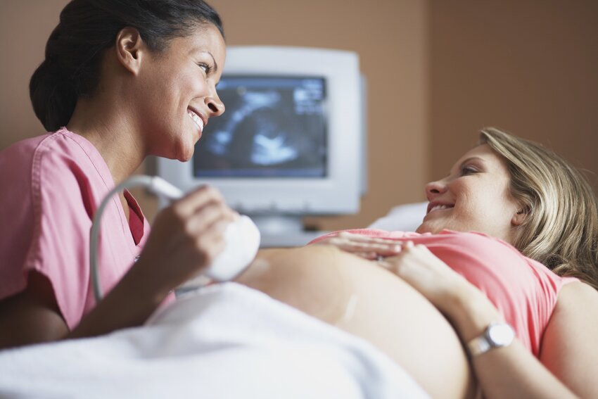 Nurse Conducting Ultrasound Examination