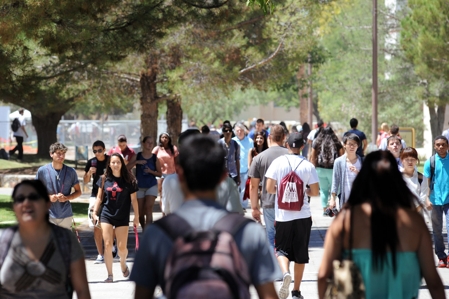 NMSU students walk the International Mall Thursday on campus on the first day of class instruction.