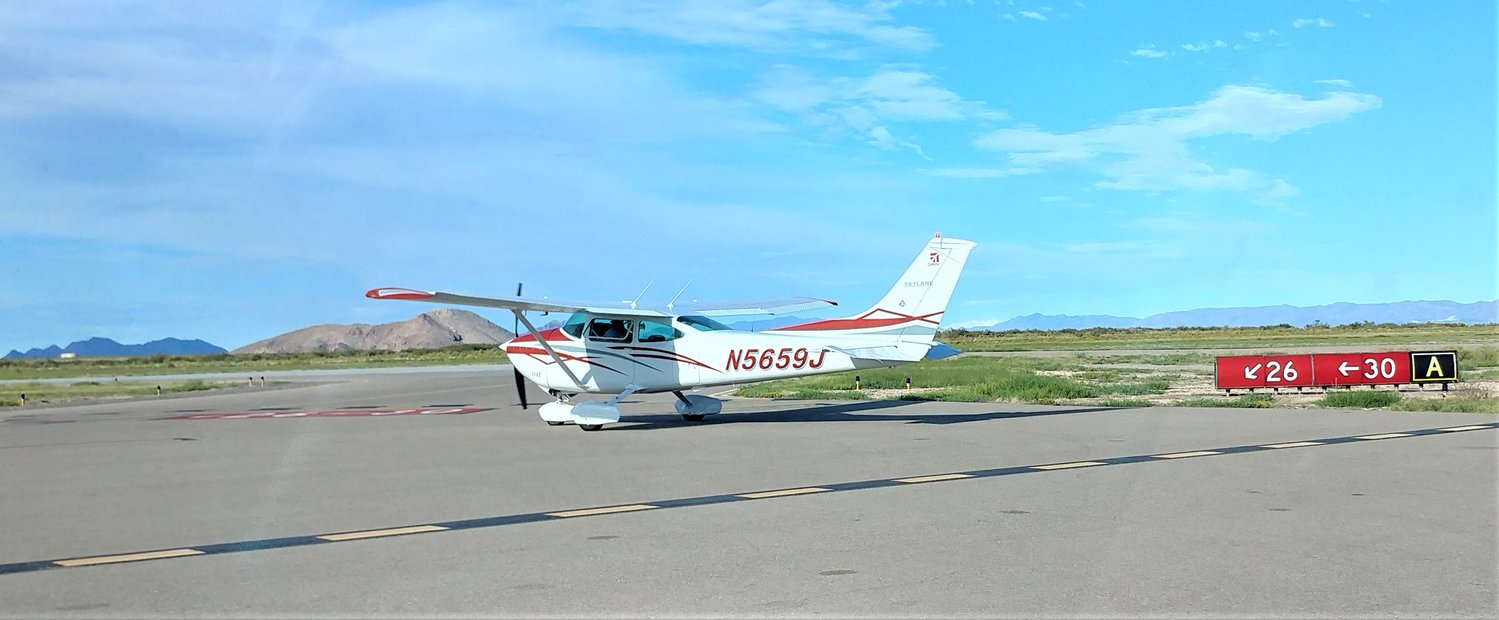 A small plane gets ready for takeoff at Las Cruces International Airport.