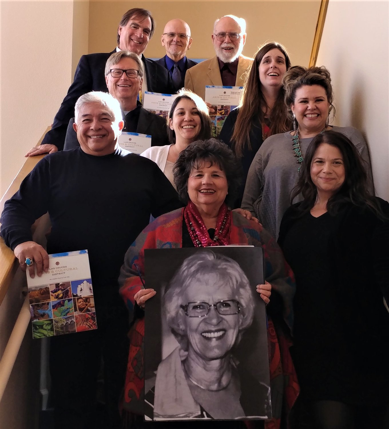 Photos courtesy of Las Cruces Arts and Culture District Coordinating Council
Members of the Las Cruces Arts and Cultural District Coordinating Council are, left to right, bottom row, Chair David Chavez, Irene-Oliver Lewis (holding a photo of founding member Kathleen Squires), Marisa Sage; second row, Julianne Lackey, Jennifer Garcia Kozlowski; third row, Greg Smith, Wayne Carl Huber; fourth row, Mike Cook (former council member).