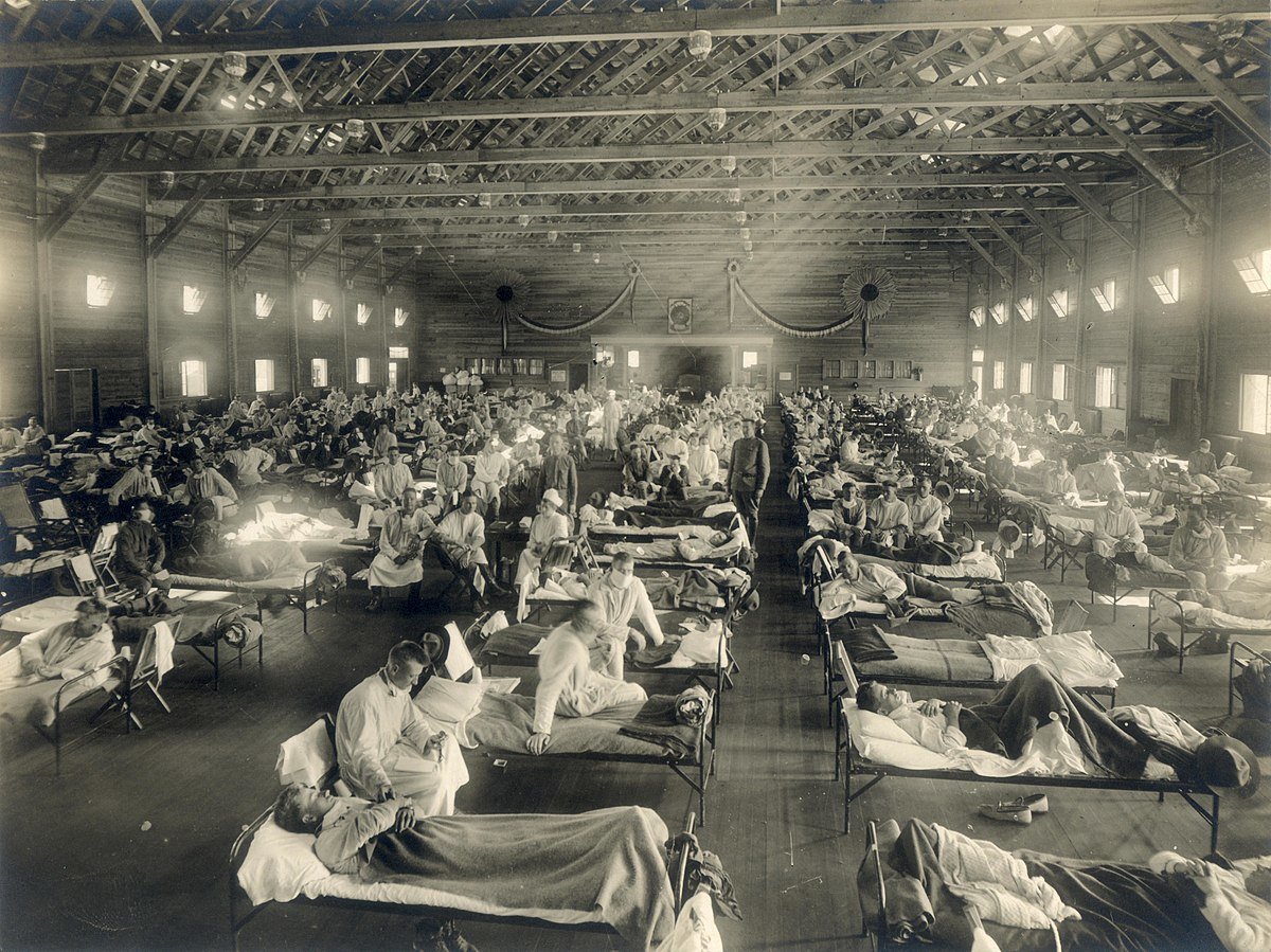 Soldiers ill with Spanish Flu at a hospital ward (Wikipedia).