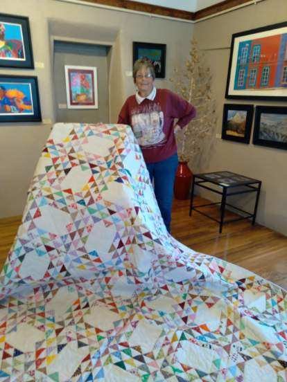 The Art Gallery will feature the beautifully detailed, hand-quilted work of artisan Trudy Kimble:  Her queen-plus-size quilt is the centerpiece for the annual raffle-ticket fundraiser to support education scholarships and will be on display now through a Nov. 20th Holiday Show.