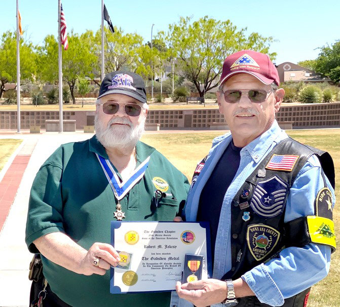 Sons of the American Revolution Gadsden Chapter President U.S. Army Capt. (Ret.) Don Williams, left, presents the chapter’s community service award to Air Force Senior Master Sgt. (Ret.) Robert M. “Bobby” Jakcsy.