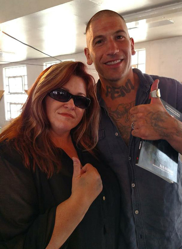 Makeup artist Pepper Gallegos with actor Jon Bernthal from the movie “Shot Caller.” Gallegos designed about 40 percent of the tattoos actors wore in this movie.