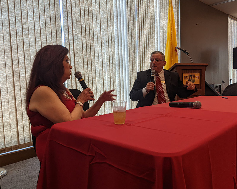 Debbi Moore, president and CEO of the Greater Las Cruces Chamber of Commerce, talks with new Las Cruces Public Schools Superintendent Ralph Ramos during a chamber luncheon on June 25 at the New Mexico Farm and Ranch Heritage Museum.