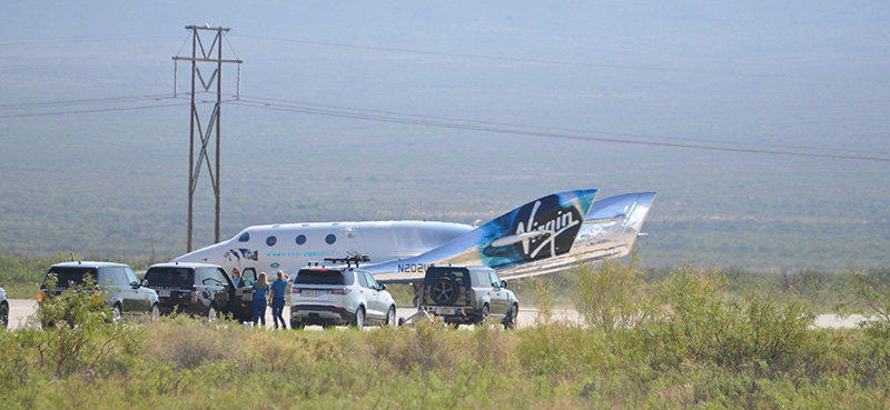 Virgin SpaceShip Unity lands and releases it's passengers at Spaceport America following its historic journey carrying Virgin Galactic founder Sir Richard Branson to space Sunday July 11.